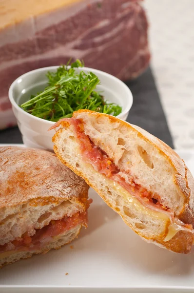 Ciabatta panini sandwich with parma ham and tomato — Stock Photo, Image