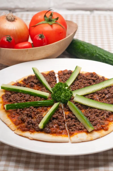 Turkish beef pizza with cucumber on top — Stock Photo, Image