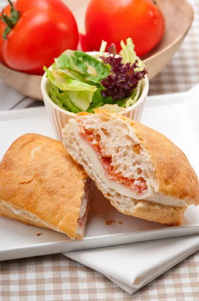 Ciabatta panini sandwich with parma ham and tomato — Stock Photo, Image