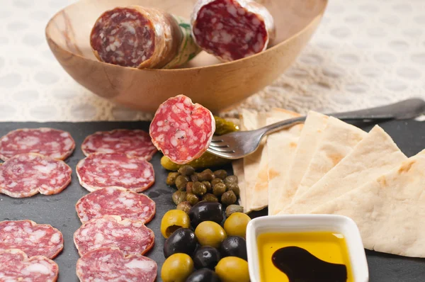 Cold cut platter with pita bread and pickles — Stock Photo, Image