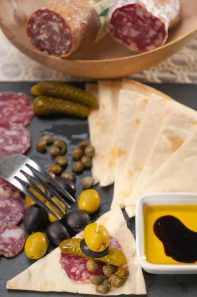 Cold cut platter with pita bread and pickles — Stock Photo, Image