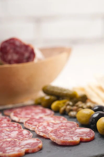 Cold cut platter with pita bread and pickles — Stock Photo, Image