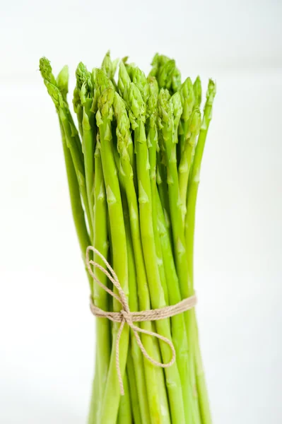 Verse asperges over Wit — Stockfoto