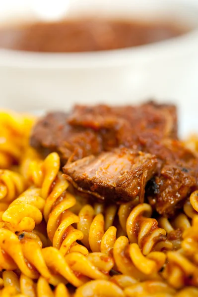 Fusilli pasta with neapolitan style ragu meat sauce — Stock Photo, Image