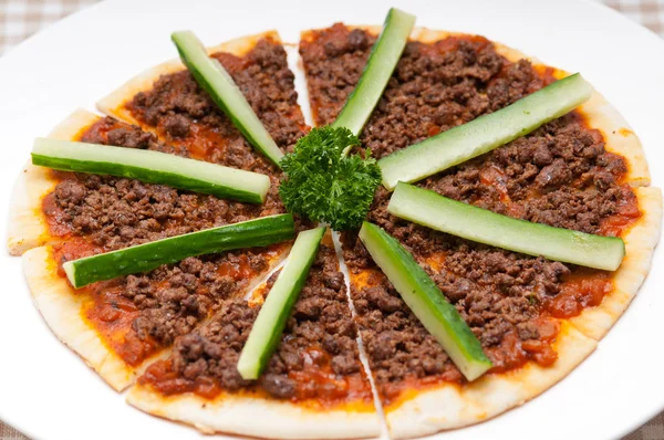 Turkish beef pizza with cucumber on top — Stock Photo, Image