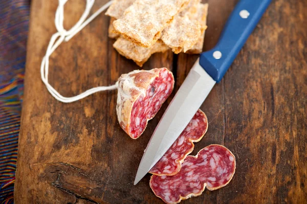 Italian salame pressato pressed slicing — Stock Photo, Image