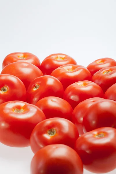 Νωπές ντομάτες απομονωμένες σε λευκό — Φωτογραφία Αρχείου