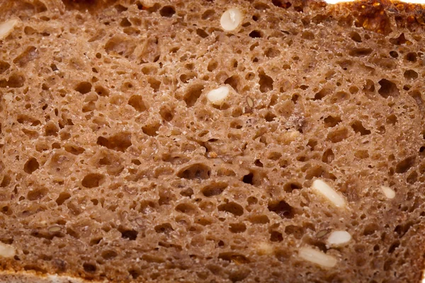 Slice of dark bread — Stock Photo, Image