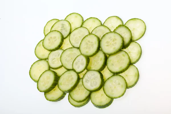 Freshly sliced cucumber isolated on white background — Stock Photo, Image