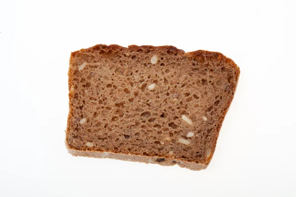 Slices of dark bread isolated over white — Stock Photo, Image