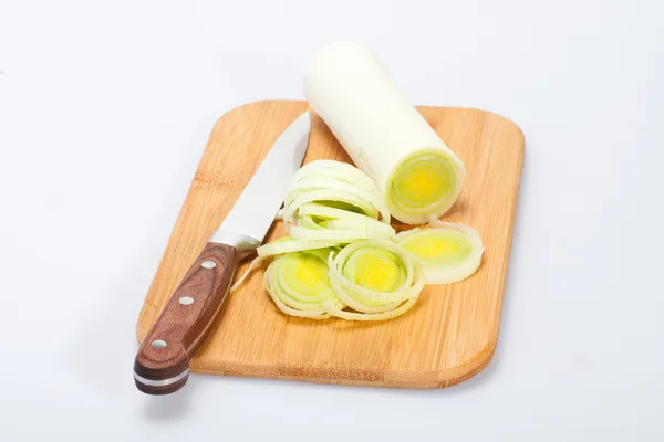 Sliced Leeks on woden table — Stock Photo, Image