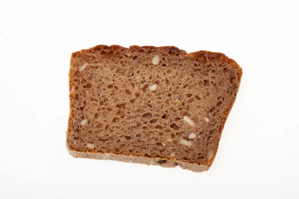 Slice of dark bread isolated over white — Stock Photo, Image