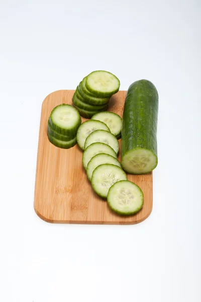 Freshly sliced cucumber isolated on white background — Stock Photo, Image