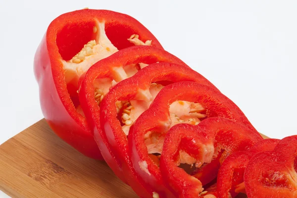 Sliced red pepper isolated on white background — Stock Photo, Image