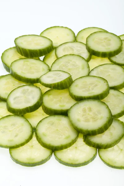 Freshly sliced cucumber isolated on white background — Stock Photo, Image