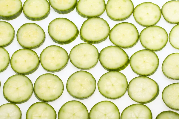 Freshly sliced cucumber isolated on white background — Stock Photo, Image