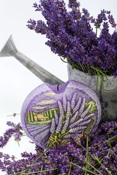 Watering Can, Candle and Lavender isolated on white — Stock Photo, Image