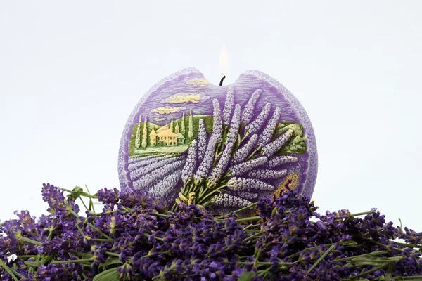 Lavender and candle isolated on white background