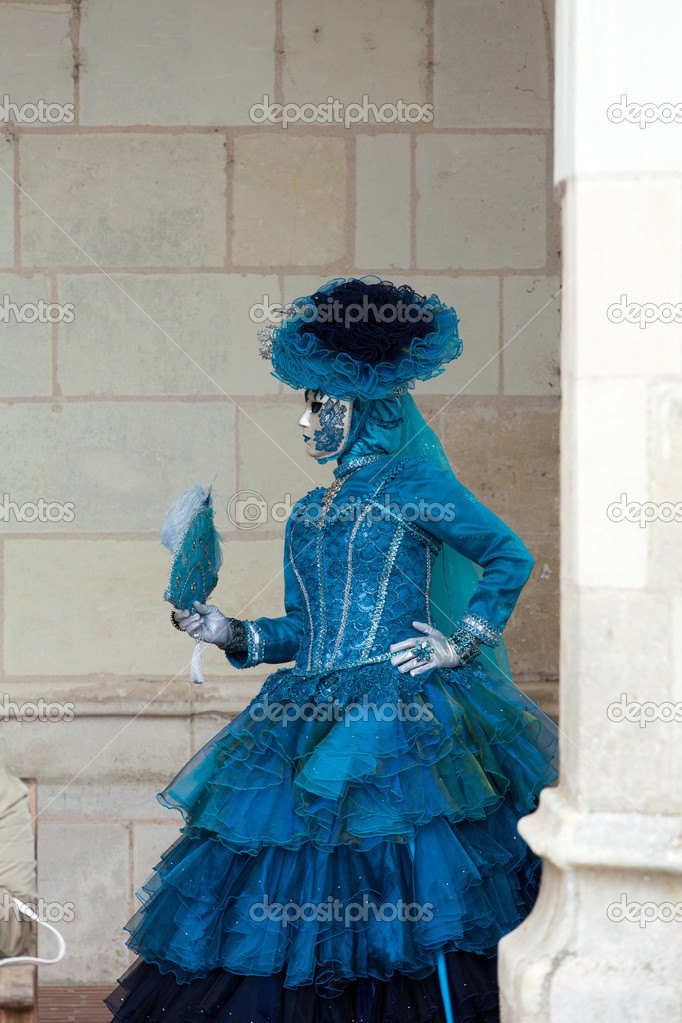 The blue lady in the carnivalesque costume and venetian mask