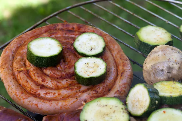 Barbecue with delicious grilled meat on grill — Stock Photo, Image