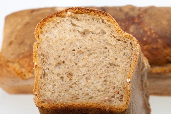 Bochníky chleba, pražené tradičně. pozadí. zblízka. — Stock fotografie