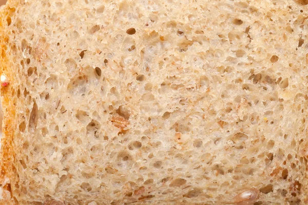 Loaves of bread traditionally roasted. Background. Close up. — Stock Photo, Image