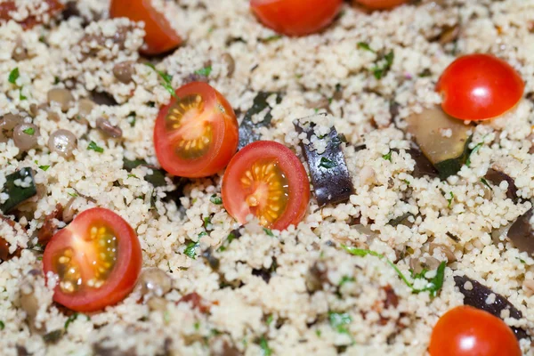 The salad with the couscous and with cocktail tomatoes — Stock Photo, Image
