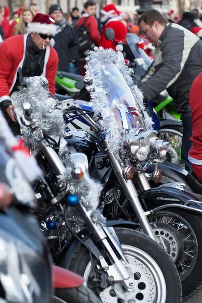 The parade of Santa Clauses on motorcycles around the Main Market Square in Cracow — Stock Photo, Image