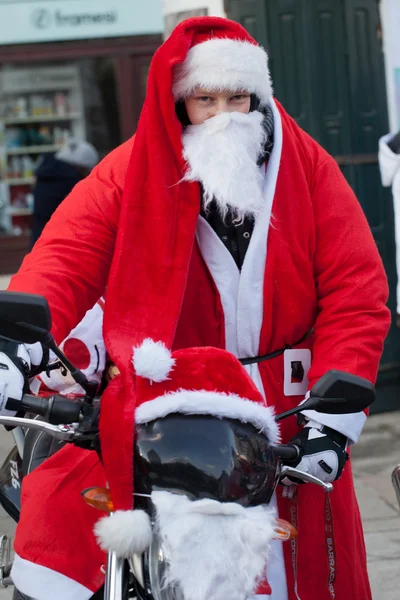 The parade of Santa Clauses on motorcycles around the Main Market Square in Cracow — Stock Photo, Image