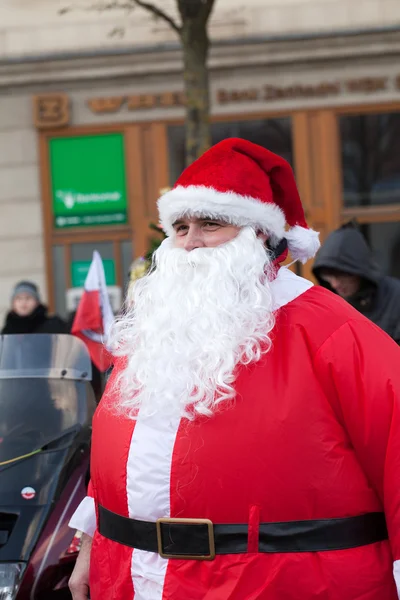 The parade of Santa Clauses on motorcycles around the Main Market Square in Cracow — Stock Photo, Image