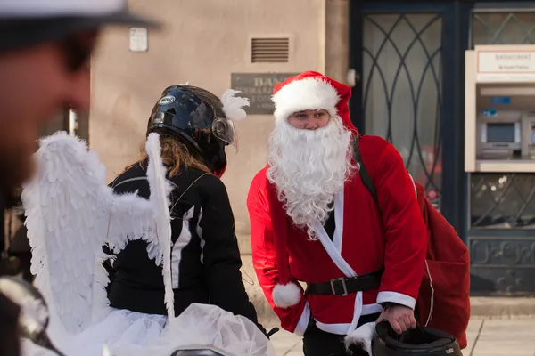 The parade of Santa Clauses on motorcycles around the Main Market Square in Cracow