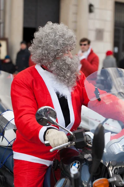 The parade of Santa Clauses on motorcycles around the Main Market Square in Cracow — Stock Photo, Image