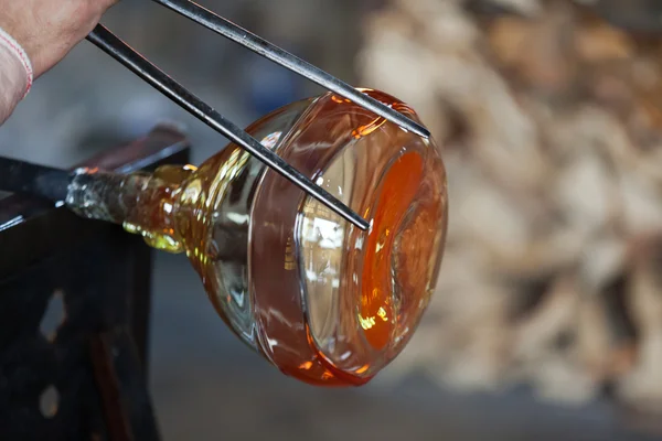 Glass blower carefully making his product — Stock Photo, Image