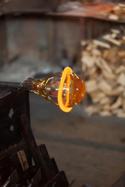 Glass blower carefully making his product — Stock Photo, Image
