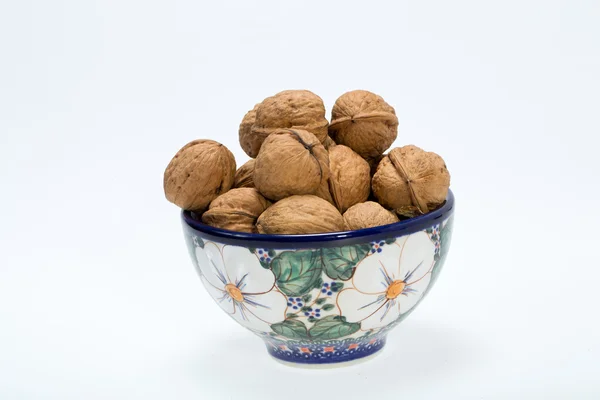 Vlašské ořechy haldy izolovaných na bílém pozadí — Stock fotografie