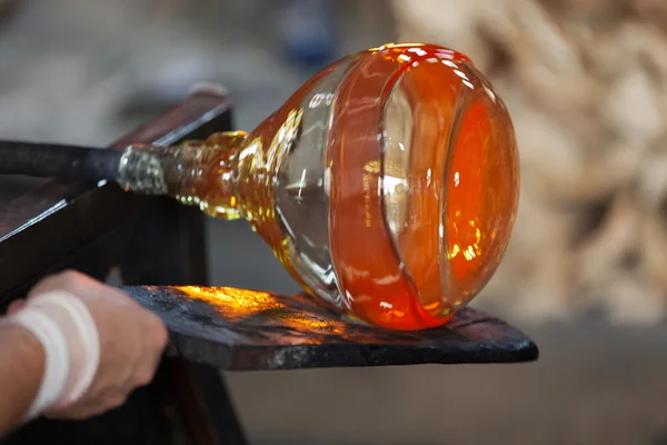 Glass blower carefully making his product — Stock Photo, Image