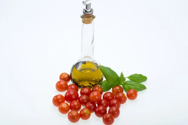 Basil, tomatoes and olive oil with the thyme — Stock Photo, Image