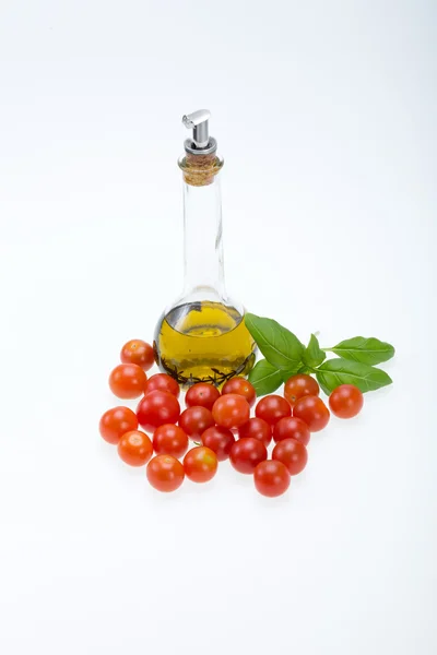 Basil, tomatoes and olive oil with the thyme — Stock Photo, Image