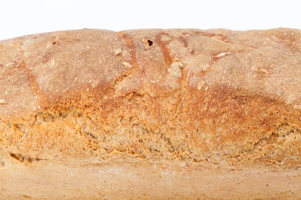 Loaves of bread traditionally roasted.  Background. Close up. — Stock Photo, Image