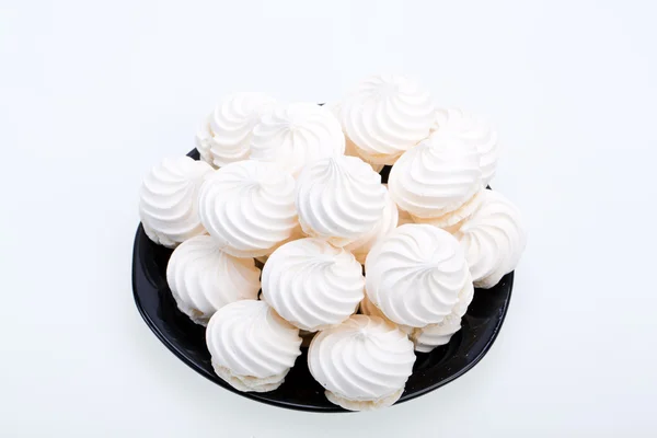 Biscuits meringue vanille française sur fond blanc — Photo