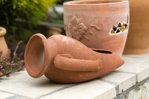 Ceremic jug in garden — Stock Photo, Image