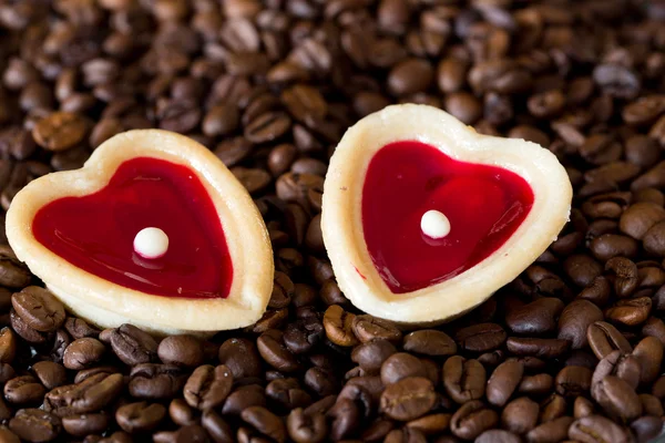 Two sweet hearts and coffe beans — Stock Photo, Image