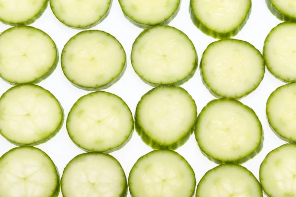 Freshly sliced cucumber  isolated on white background — Stock Photo, Image