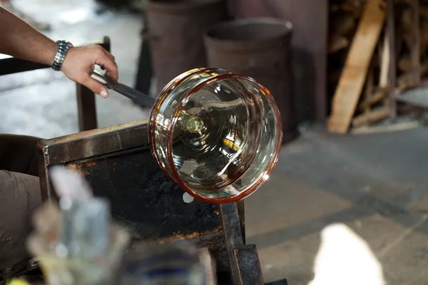 Glass blower carefully making his product — Stock Photo, Image