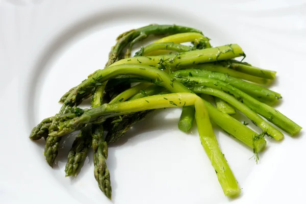 Green asparaguses with the fresh dill — Stock Photo, Image