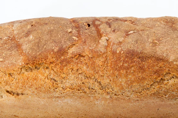 Loaves of bread traditionally roasted.  Background. Close up. — Stock Photo, Image