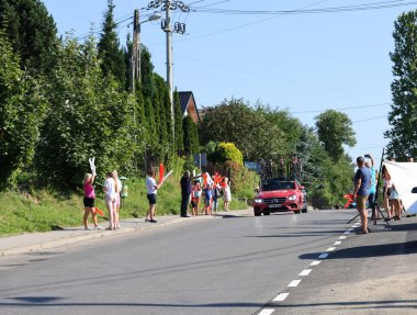 Krakow, Poland - August 5, 2022:  Cofidis Team vehicle on the route of Tour de Pologne UCI  World Tour, stage 7 Skawina - Krakow. The biggest cycling event in Eastern Europe