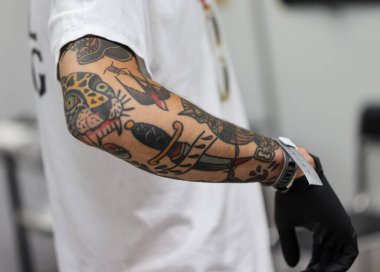 Krakow, Poland -  June 11, 2022: Unidentified  participant at 15th Tattoofest Convention in Cracow. One of the most prestigious tattoo festivals. 