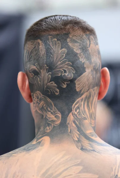 Krakow, Poland -  June 11, 2022: Unidentified  participant at 15th Tattoofest Convention in Cracow. One of the most prestigious tattoo festivals. 