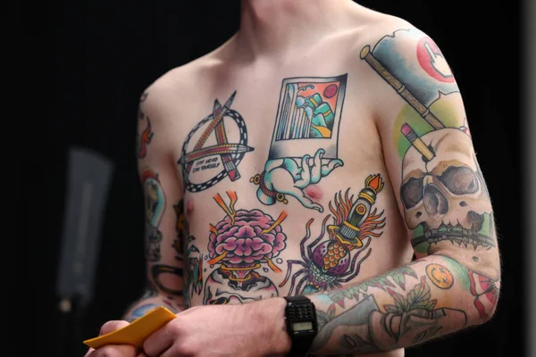 Krakow, Poland -  June 11, 2022: Unidentified  participant at 15th Tattoofest Convention in Cracow. One of the most prestigious tattoo festivals. 